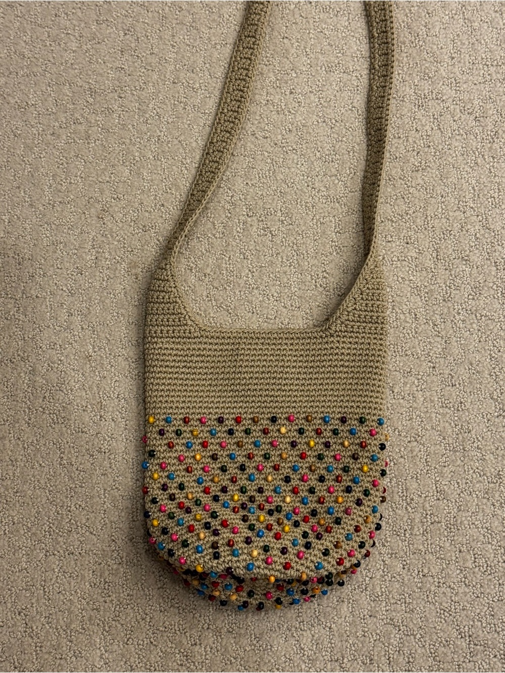 The Sak crochet beaded small crossbody bucket bag